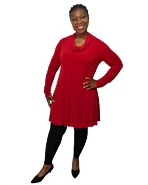 Norah wears a red bon miracle shape slouch cowl top with black leggings