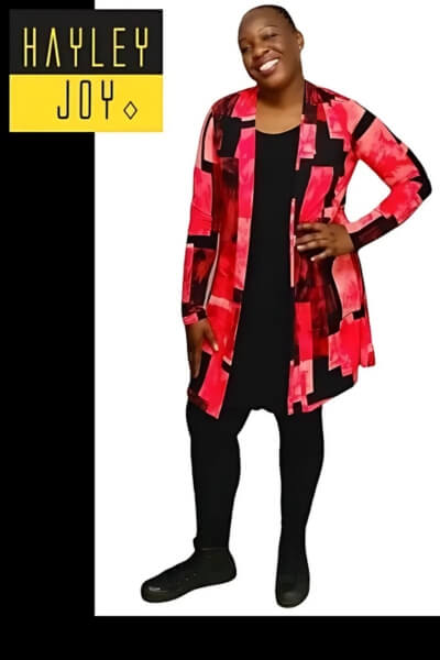 Brilly is wearing a medium Stolling cardigan, over a medium top and large leggings - YELLOW label