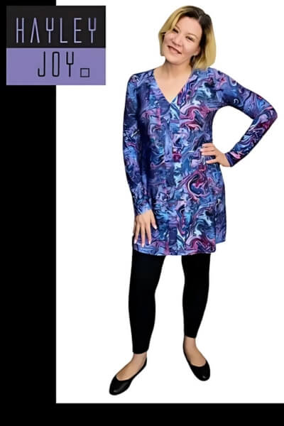 Taryn is wearing a Blue Marble, small Miracle stolling top with black Medium leggings - LILAC label
