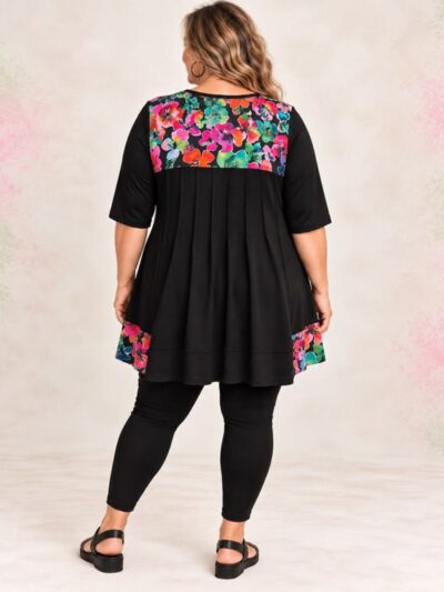 Rainbow Floral plus size pintuck top, back view, pintucked black back with bright flower print yoke and hem panels - Hayley Joy