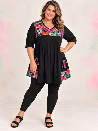 Rainbow Floral plus size pintuck top, front view, black with bright pink, orange and green flowers at the yoke and pocket ties - Hayley Joy